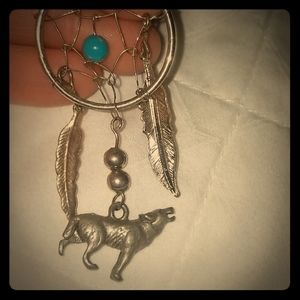 Dream catcher in pendant with Wolf